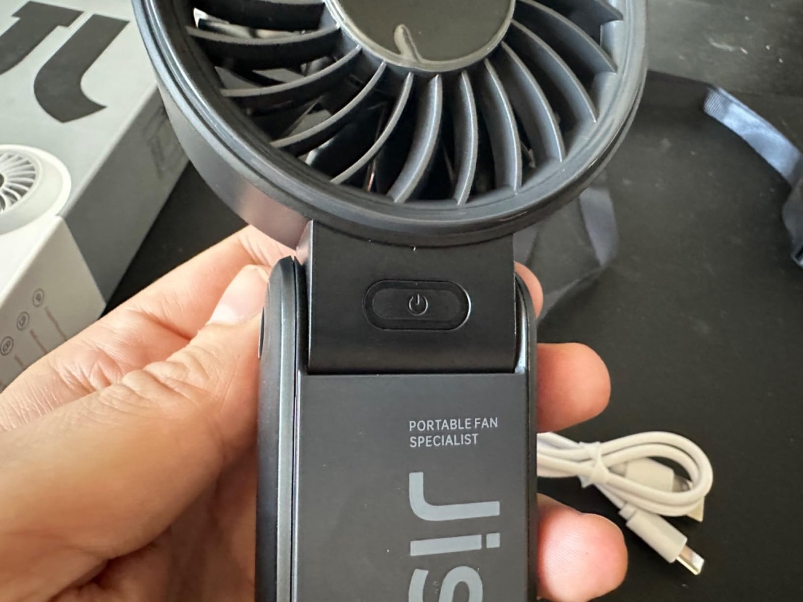 JISULIFE Handheld Fan Life7 – Ultimate Flexibility: High-Power Motor. LED Display. 19.5 Hrs Cooling. 5000mAh Rechargeable. 5-Speed. Foldable Design. 3-IN-1 Portable Fan for Travel Cruise Beach(Grey) photo review