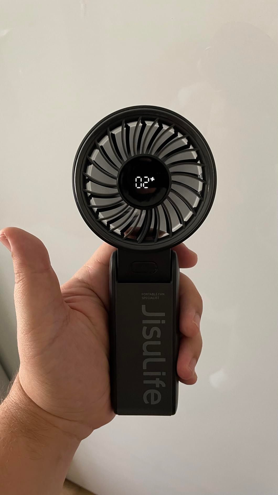 JISULIFE Handheld Fan Life7 – Ultimate Flexibility: High-Power Motor. LED Display. 19.5 Hrs Cooling. 5000mAh Rechargeable. 5-Speed. Foldable Design. 3-IN-1 Portable Fan for Travel Cruise Beach(Grey) photo review
