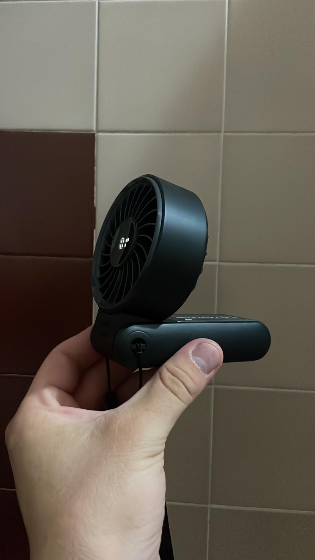 JISULIFE Handheld Fan Life7 – Ultimate Flexibility: High-Power Motor. LED Display. 19.5 Hrs Cooling. 5000mAh Rechargeable. 5-Speed. Foldable Design. 3-IN-1 Portable Fan for Travel Cruise Beach(Grey) photo review