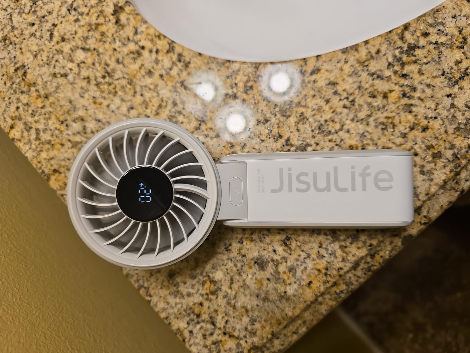 JISULIFE Handheld Fan Life7 – Ultimate Flexibility: High-Power Motor. LED Display. 19.5 Hrs Cooling. 5000mAh Rechargeable. 5-Speed. Foldable Design. 3-IN-1 Portable Fan for Travel Cruise Beach(Grey) photo review