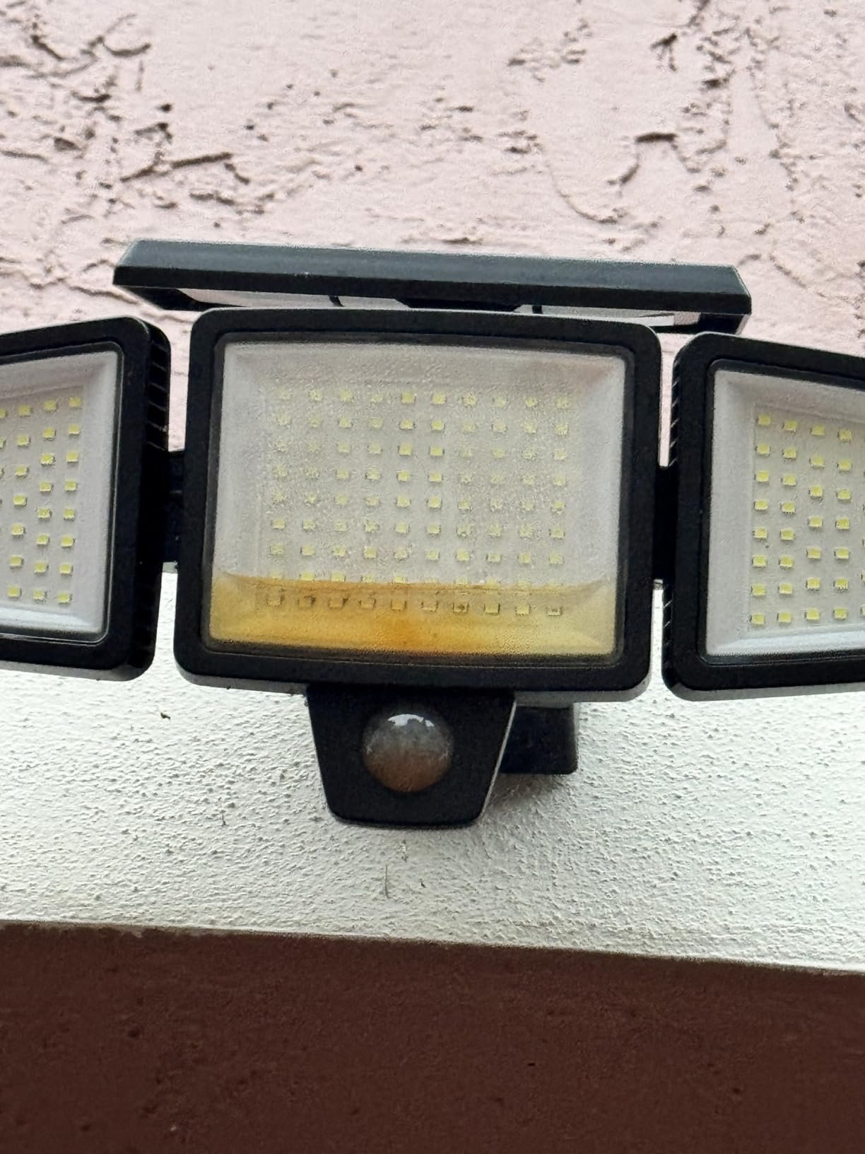 Tuffenough Solar Outdoor Lights 2500LM 210 LED Security Lights with Remote Control.3 Heads Motion Sensor Lights. IP65 Waterproof.270° Wide Angle Flood Wall Lights with 3 Modes(2 Packs) photo review