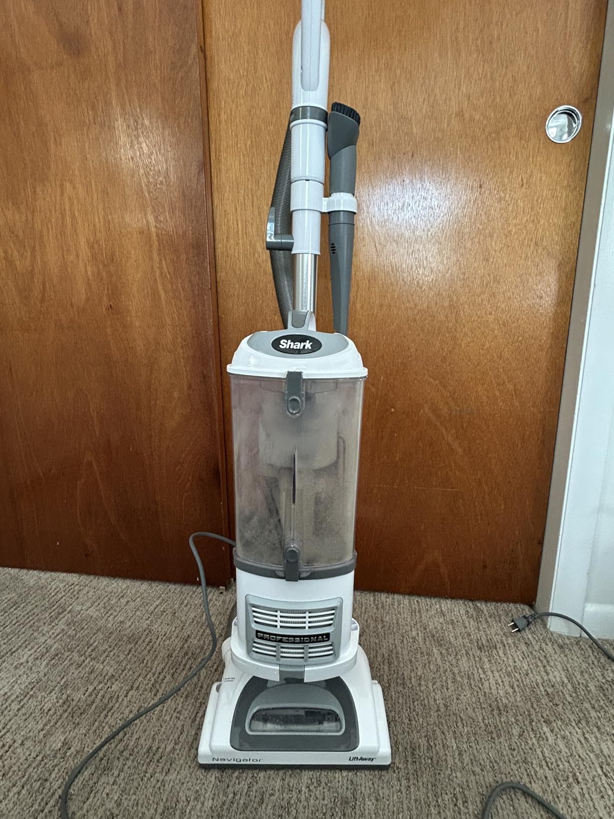 Shark Upright Vacuum. Navigator Lift-Away Deluxe with Large Dust Cup Capacity. HEPA Filter. Swivel Steering. Upholstery Tool & Crevice Tool. Blue. NV360 photo review