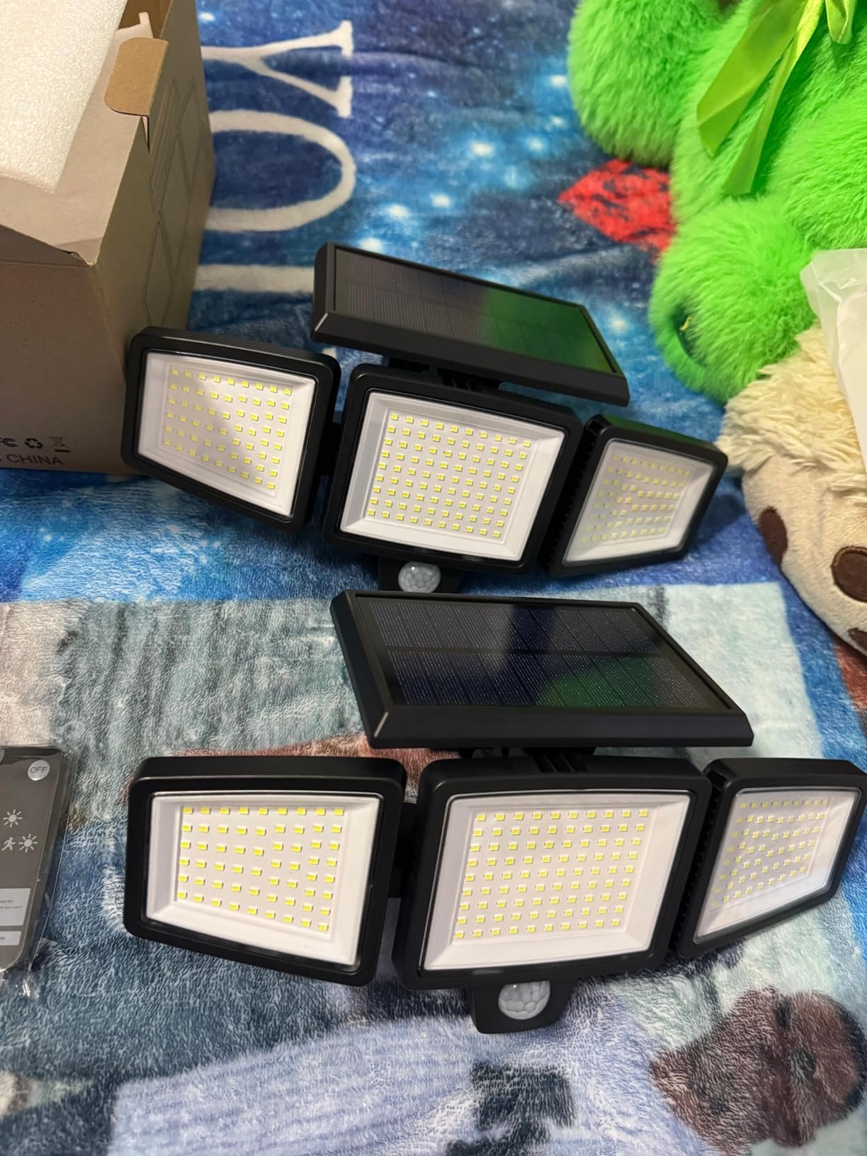 Tuffenough Solar Outdoor Lights 2500LM 210 LED Security Lights with Remote Control.3 Heads Motion Sensor Lights. IP65 Waterproof.270° Wide Angle Flood Wall Lights with 3 Modes(2 Packs) photo review